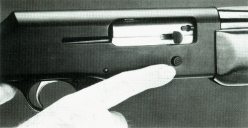 Figure 2. Bolt release button location.