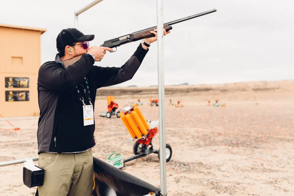 Foster shooting A-5 semi-auto shotgun at Shot Show range day