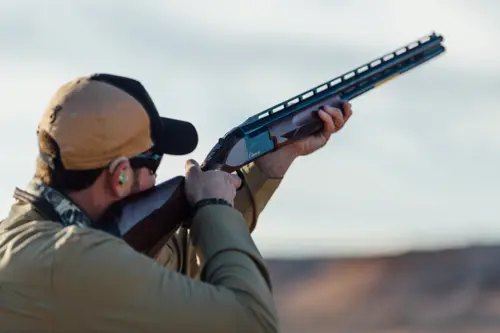 Foster Bartholow aiming Citori shotgun