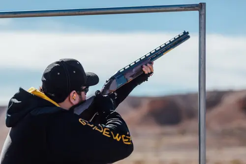 Matt Bartholow aiming Citori shotgun